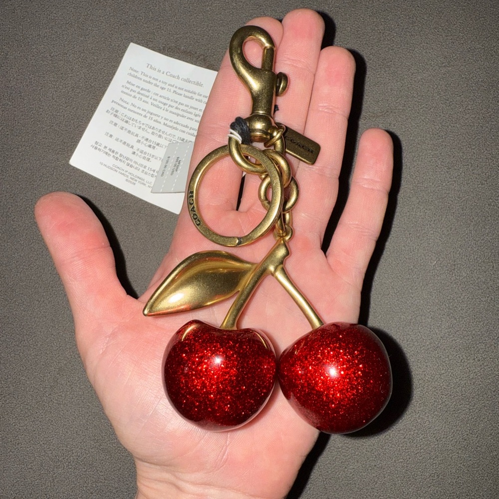 COACH Gold Tone Cherry Keychain with Red Glitter Cherries